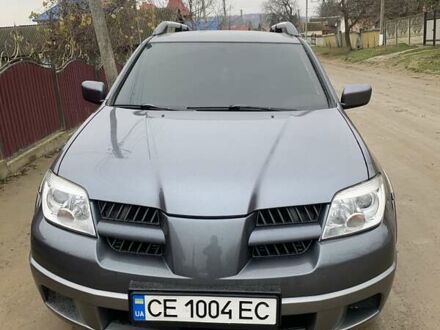 Сірий Міцубісі Аутлендер, об'ємом двигуна 2.4 л та пробігом 230 тис. км за 5927 $, фото 1 на Automoto.ua