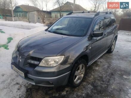 Мицубиси Аутлендер 2006 в Конотопе на Automoto.ua Серый Мицубиси Аутлендер, объемом двигателя 2.4 л и пробегом 254 тыс. км за 6000 $, фото 1 на Automoto.ua