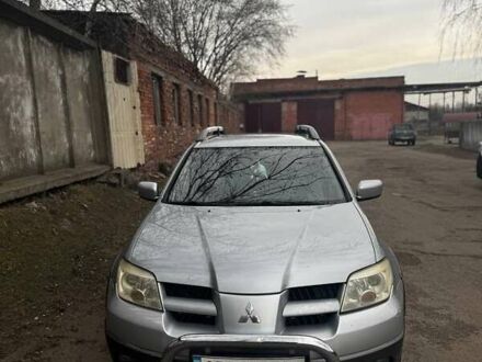 Мицубиси Аутлендер 2006 в Чернигове на Automoto.ua Серый Мицубиси Аутлендер, объемом двигателя 2.38 л и пробегом 140 тыс. км за 6200 $, фото 1 на Automoto.ua
