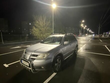 Мицубиси Аутлендер 2006 в Чернигове на Automoto.ua Серый Мицубиси Аутлендер, объемом двигателя 2.4 л и пробегом 237 тыс. км за 7000 $, фото 1 на Automoto.ua