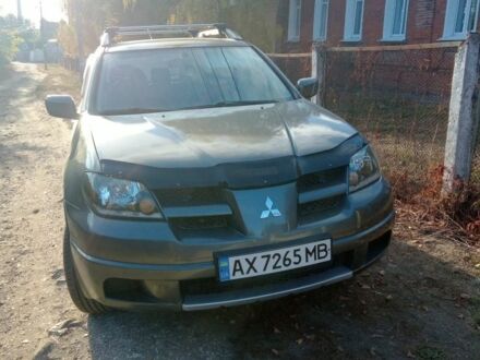 Мицубиси Аутлендер 2006 в Купянске на Automoto.ua Серый Мицубиси Аутлендер, объемом двигателя 2 л и пробегом 200 тыс. км за 6900 $, фото 1 на Automoto.ua