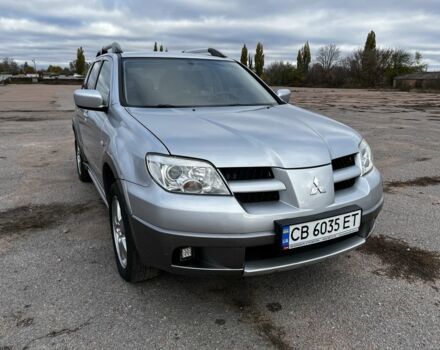 Серый Мицубиси Аутлендер, объемом двигателя 2.4 л и пробегом 264 тыс. км за 6300 $, фото 1 на Automoto.ua