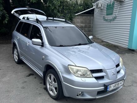 Мицубиси Аутлендер 2006 в Александрие на Automoto.ua Серый Мицубиси Аутлендер, объемом двигателя 2.4 л и пробегом 240 тыс. км за 5900 $, фото 1 на Automoto.ua
