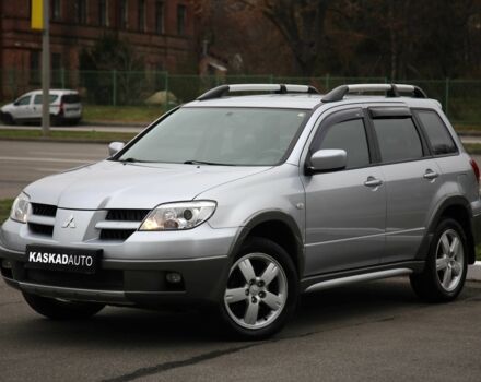 Серый Мицубиси Аутлендер, объемом двигателя 2.4 л и пробегом 171 тыс. км за 8200 $, фото 1 на Automoto.ua