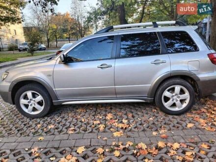 Мицубиси Аутлендер 2006 в Ивано-Франковске на Automoto.ua Серый Мицубиси Аутлендер, объемом двигателя 2.4 л и пробегом 186 тыс. км за 6350 $, фото 1 на Automoto.ua