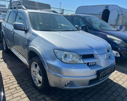 Серый Мицубиси Аутлендер, объемом двигателя 2.4 л и пробегом 220 тыс. км за 3369 $, фото 1 на Automoto.ua