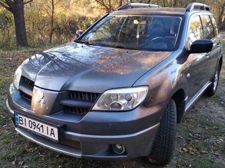 Мицубиси Аутлендер 2006 в Миргороде на Automoto.ua Серый Мицубиси Аутлендер, объемом двигателя 2 л и пробегом 210 тыс. км за 7799 $, фото 1 на Automoto.ua