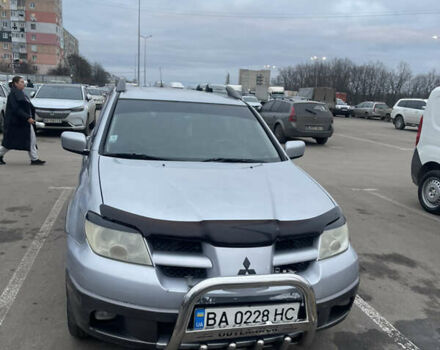 Серый Мицубиси Аутлендер, объемом двигателя 2.4 л и пробегом 307 тыс. км за 4000 $, фото 1 на Automoto.ua