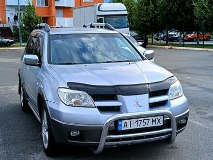 Мицубиси Аутлендер 2006 в Буче на Automoto.ua Серый Мицубиси Аутлендер, объемом двигателя 2.4 л и пробегом 260 тыс. км за 5250 $, фото 1 на Automoto.ua
