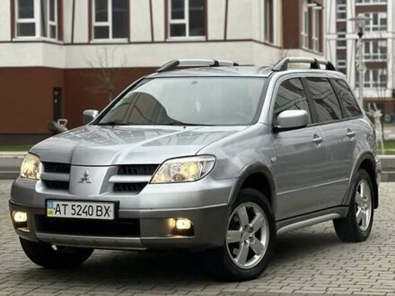 Сірий Міцубісі Аутлендер, об'ємом двигуна 2.4 л та пробігом 98 тис. км за 7199 $, фото 1 на Automoto.ua