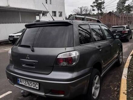 Сірий Міцубісі Аутлендер, об'ємом двигуна 2 л та пробігом 310 тис. км за 5200 $, фото 1 на Automoto.ua