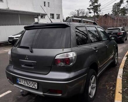 Сірий Міцубісі Аутлендер, об'ємом двигуна 2 л та пробігом 310 тис. км за 5200 $, фото 1 на Automoto.ua