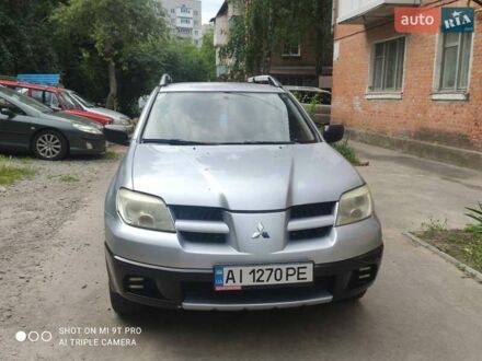 Мицубиси Аутлендер 2006 в Белой Церкве на Automoto.ua Серый Мицубиси Аутлендер, объемом двигателя 2 л и пробегом 240 тыс. км за 5700 $, фото 1 на Automoto.ua