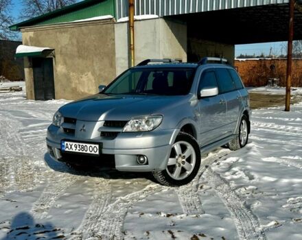 Серый Мицубиси Аутлендер, объемом двигателя 2.4 л и пробегом 201 тыс. км за 6600 $, фото 1 на Automoto.ua