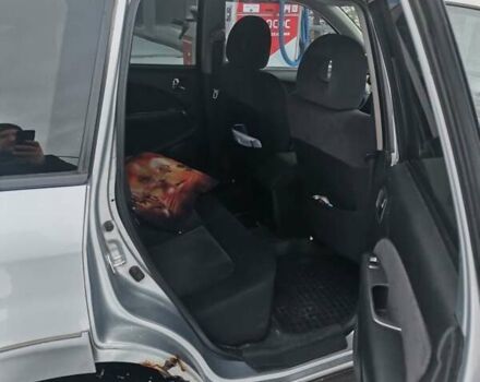 Серый Мицубиси Аутлендер, объемом двигателя 2.38 л и пробегом 320 тыс. км за 6500 $, фото 1 на Automoto.ua