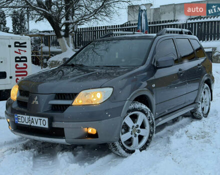 Сірий Міцубісі Аутлендер, об'ємом двигуна 2.4 л та пробігом 216 тис. км за 5999 $, фото 1 на Automoto.ua