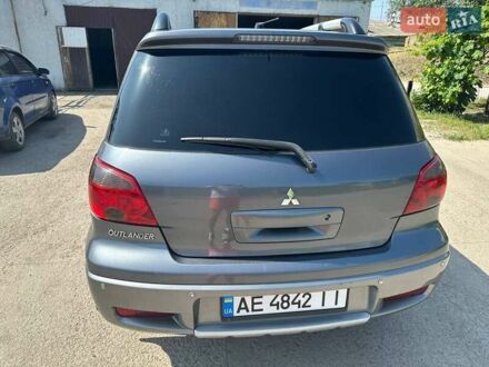 Мицубиси Аутлендер 2006 в Каменское - Днепродзержинск на Automoto.ua Серый Мицубиси Аутлендер, объемом двигателя 2.38 л и пробегом 207 тыс. км за 6400 $, фото 1 на Automoto.ua