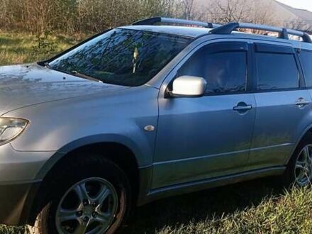 Мицубиси Аутлендер 2006 в Жмеренке на Automoto.ua Серый Мицубиси Аутлендер, объемом двигателя 2 л и пробегом 246 тыс. км за 6000 $, фото 1 на Automoto.ua