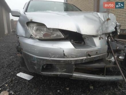 Серый Мицубиси Аутлендер, объемом двигателя 2 л и пробегом 190 тыс. км за 2800 $, фото 1 на Automoto.ua