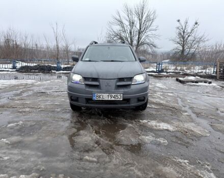 Серый Мицубиси Аутлендер, объемом двигателя 2 л и пробегом 300 тыс. км за 3050 $, фото 1 на Automoto.ua