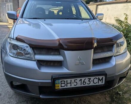 Сірий Міцубісі Аутлендер, об'ємом двигуна 2.38 л та пробігом 137 тис. км за 5500 $, фото 1 на Automoto.ua
