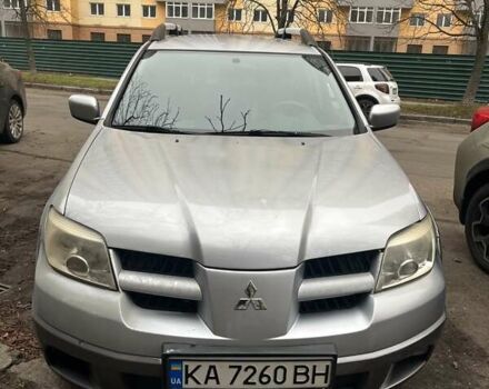 Серый Мицубиси Аутлендер, объемом двигателя 2.4 л и пробегом 179 тыс. км за 7000 $, фото 1 на Automoto.ua