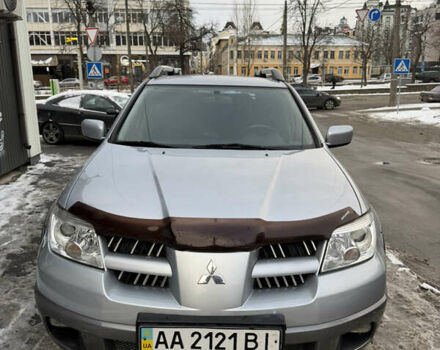 Сірий Міцубісі Аутлендер, об'ємом двигуна 2.38 л та пробігом 101 тис. км за 7000 $, фото 1 на Automoto.ua