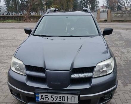 Серый Мицубиси Аутлендер, объемом двигателя 2 л и пробегом 191 тыс. км за 6500 $, фото 1 на Automoto.ua