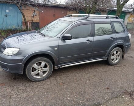 Серый Мицубиси Аутлендер, объемом двигателя 0 л и пробегом 210 тыс. км за 5650 $, фото 1 на Automoto.ua