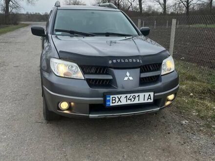 Сірий Міцубісі Аутлендер, об'ємом двигуна 2 л та пробігом 285 тис. км за 7300 $, фото 1 на Automoto.ua