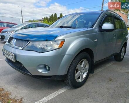 Серый Мицубиси Аутлендер, объемом двигателя 2.4 л и пробегом 191 тыс. км за 9200 $, фото 1 на Automoto.ua
