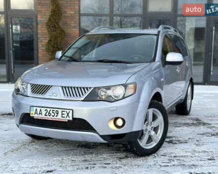 Серый Мицубиси Аутлендер, объемом двигателя 2.4 л и пробегом 127 тыс. км за 10650 $, фото 1 на Automoto.ua