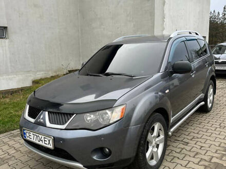 Сірий Міцубісі Аутлендер, об'ємом двигуна 2.36 л та пробігом 380 тис. км за 10000 $, фото 1 на Automoto.ua