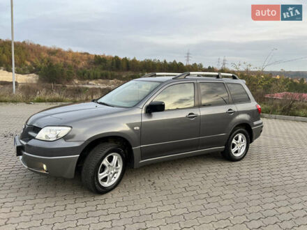 Сірий Міцубісі Аутлендер, об'ємом двигуна 2 л та пробігом 192 тис. км за 6400 $, фото 1 на Automoto.ua