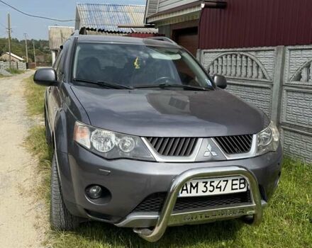 Серый Мицубиси Аутлендер, объемом двигателя 2 л и пробегом 260 тыс. км за 8400 $, фото 1 на Automoto.ua