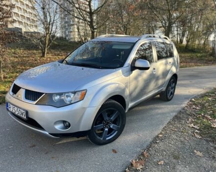 Серый Мицубиси Аутлендер, объемом двигателя 2 л и пробегом 255 тыс. км за 3935 $, фото 1 на Automoto.ua