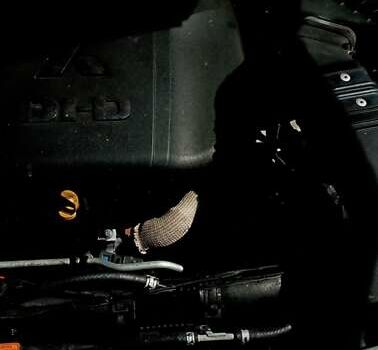 Серый Мицубиси Аутлендер, объемом двигателя 2.18 л и пробегом 225 тыс. км за 9990 $, фото 1 на Automoto.ua