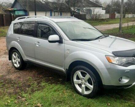 Серый Мицубиси Аутлендер, объемом двигателя 3 л и пробегом 183 тыс. км за 9200 $, фото 1 на Automoto.ua