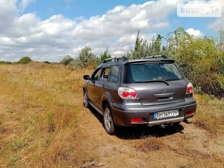 Сірий Міцубісі Аутлендер, об'ємом двигуна 2 л та пробігом 227 тис. км за 6000 $, фото 1 на Automoto.ua