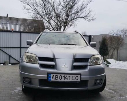 Серый Мицубиси Аутлендер, объемом двигателя 2.4 л и пробегом 380 тыс. км за 6500 $, фото 1 на Automoto.ua