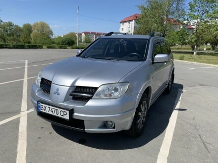 Мицубиси Аутлендер 2007 в Ровно на Automoto.ua Серый Мицубиси Аутлендер, объемом двигателя 2.4 л и пробегом 176 тыс. км за 7350 $, фото 1 на Automoto.ua