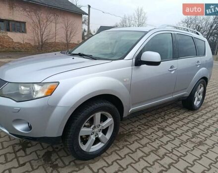 Серый Мицубиси Аутлендер, объемом двигателя 2 л и пробегом 332 тыс. км за 7650 $, фото 1 на Automoto.ua