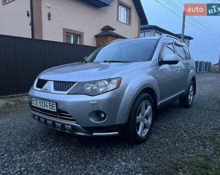 Серый Мицубиси Аутлендер, объемом двигателя 2.4 л и пробегом 236 тыс. км за 7600 $, фото 1 на Automoto.ua