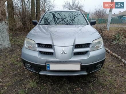 Мицубиси Аутлендер 2007 в Золотоноше на Automoto.ua Серый Мицубиси Аутлендер, объемом двигателя 2 л и пробегом 263 тыс. км за 6200 $, фото 1 на Automoto.ua