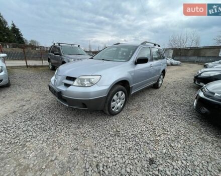 Сірий Міцубісі Аутлендер, об'ємом двигуна 2 л та пробігом 128 тис. км за 5900 $, фото 1 на Automoto.ua