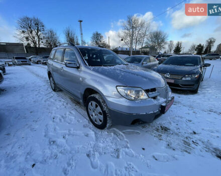 Серый Мицубиси Аутлендер, объемом двигателя 2 л и пробегом 128 тыс. км за 6700 $, фото 1 на Automoto.ua