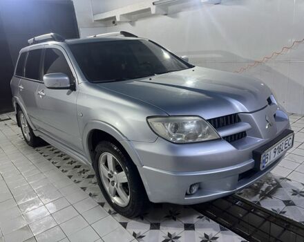 Сірий Міцубісі Аутлендер, об'ємом двигуна 2.4 л та пробігом 300 тис. км за 5999 $, фото 1 на Automoto.ua