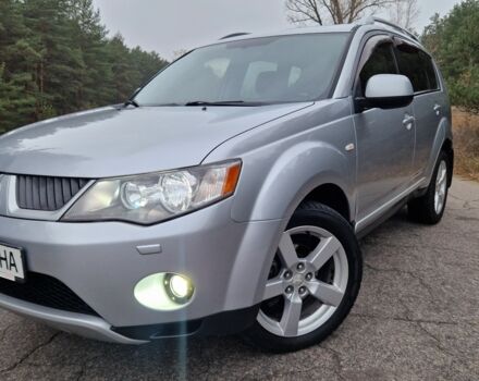Серый Мицубиси Аутлендер, объемом двигателя 3 л и пробегом 197 тыс. км за 9500 $, фото 1 на Automoto.ua