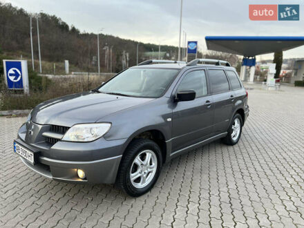 Сірий Міцубісі Аутлендер, об'ємом двигуна 2 л та пробігом 196 тис. км за 6450 $, фото 1 на Automoto.ua