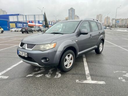 Серый Мицубиси Аутлендер, объемом двигателя 2 л и пробегом 235 тыс. км за 4800 $, фото 1 на Automoto.ua